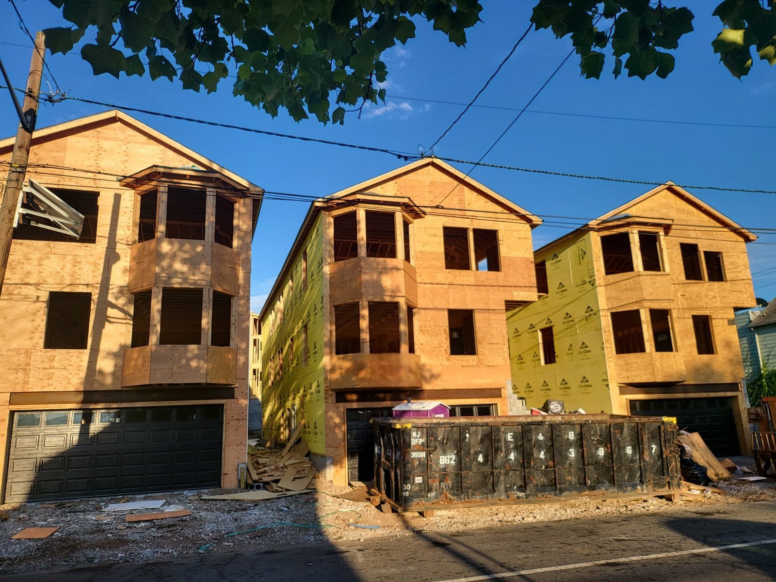 Three townhomes framed and under construction